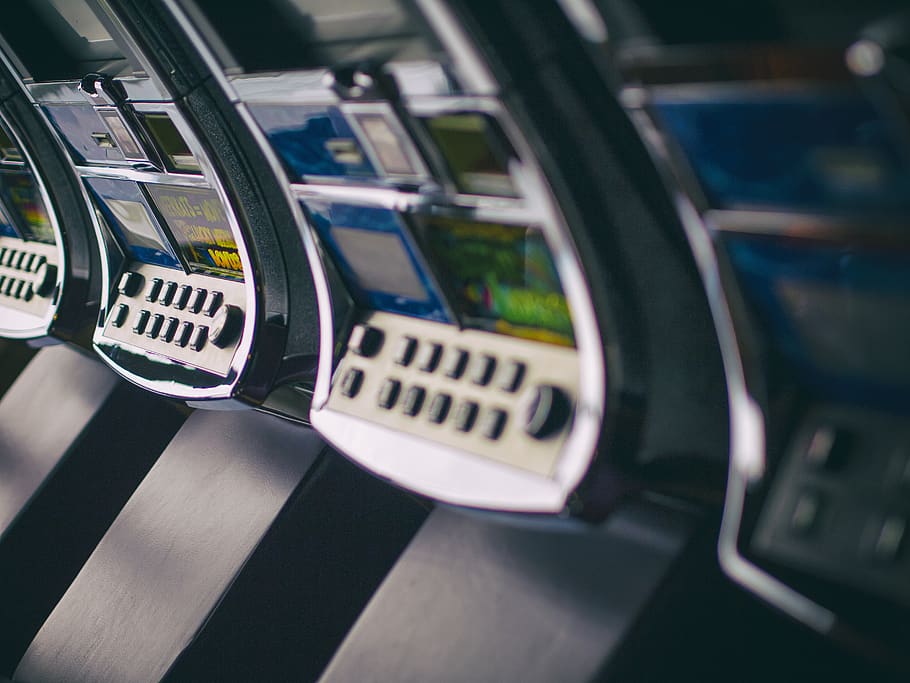 Close-up of slot machines in a casino setting